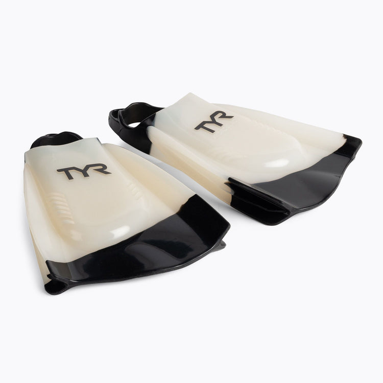 TYR HydroBlade training swim fins with white body and black short blades against a white studio background. Product photograph via Sportano.