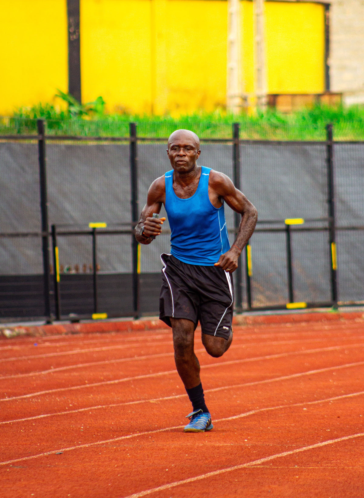 Runner on an outdoor track during 5K training