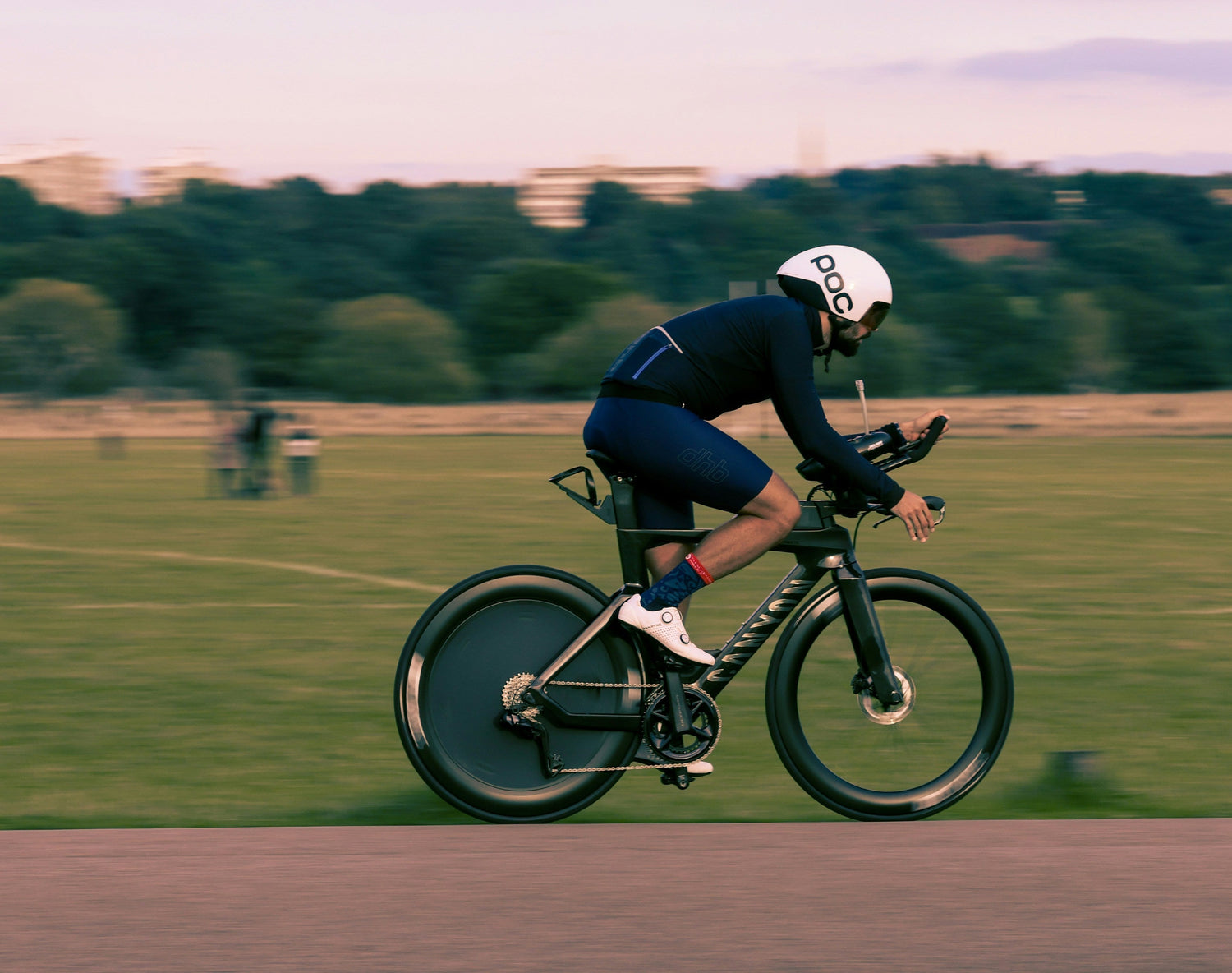 Cyclist riding outdoors during a power-based training session