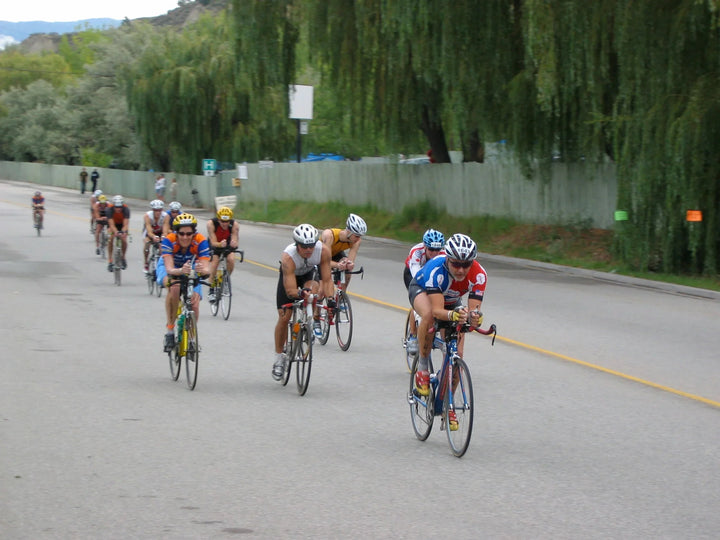 Triathletes riding the bike leg of a long-course race