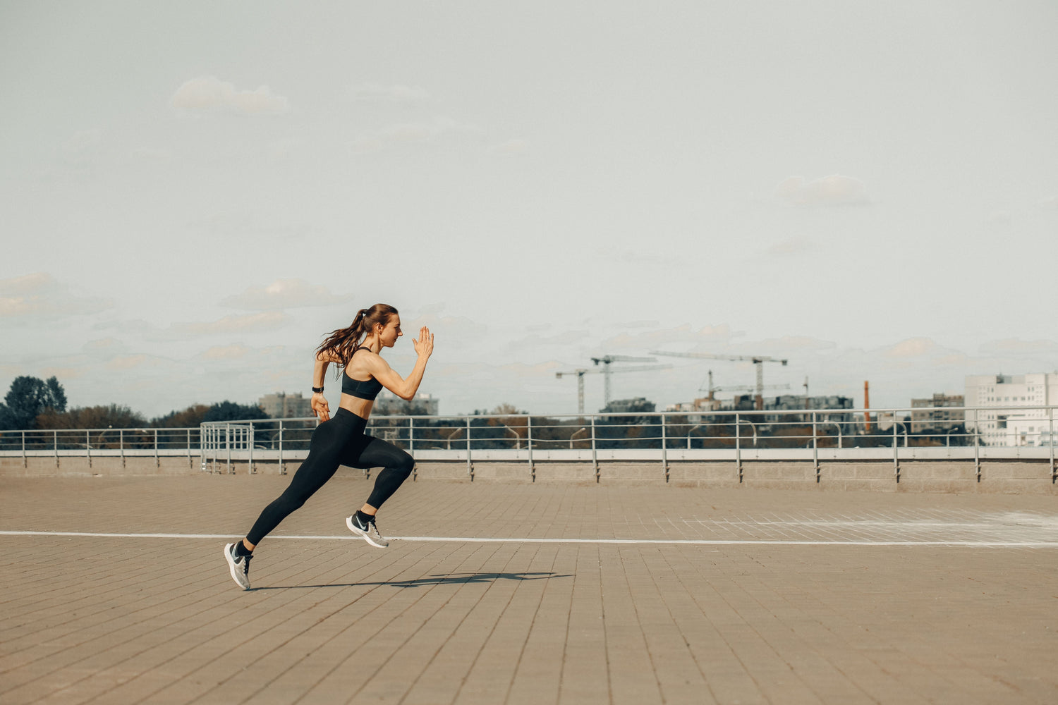 Runner completing a controlled interval training workout