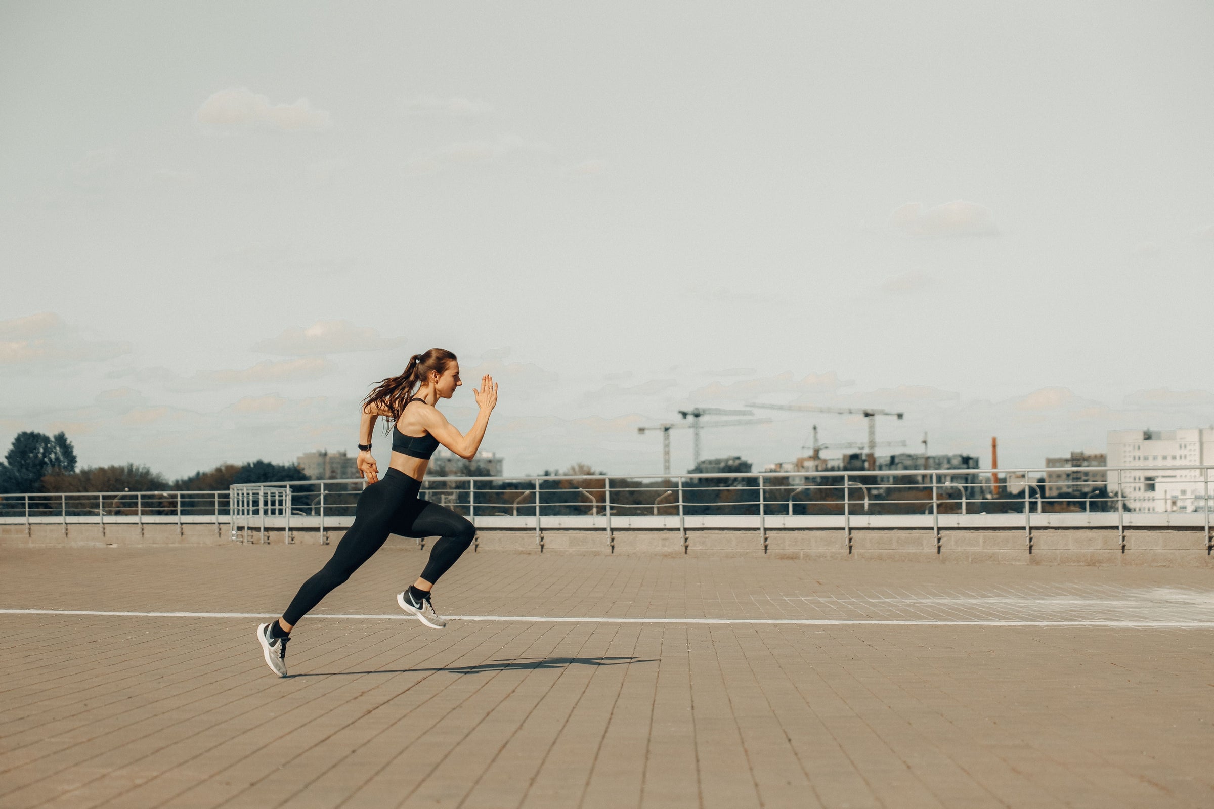 Runner completing a controlled interval training workout