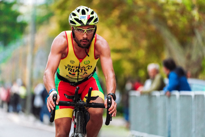 Triathlete cycling during a long-distance triathlon race