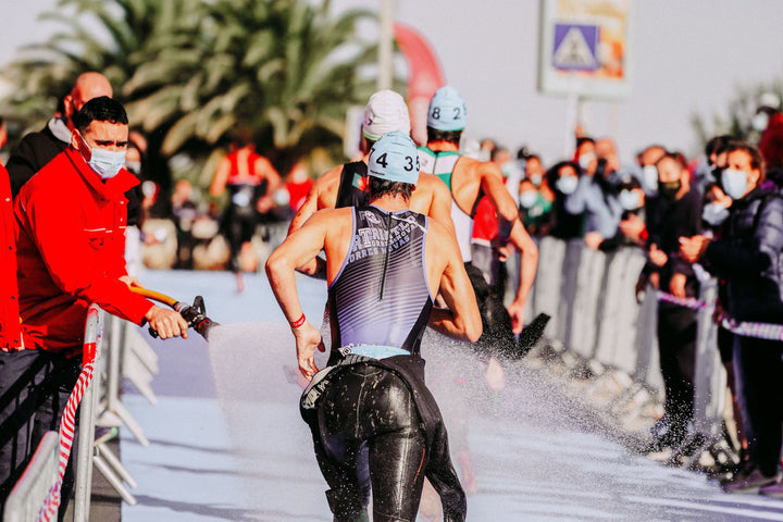 Triathlete training outdoors for a full-distance Ironman race
