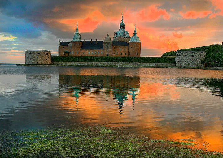 Castle beside the water in Kalmar, Sweden, under a cloudy sky
