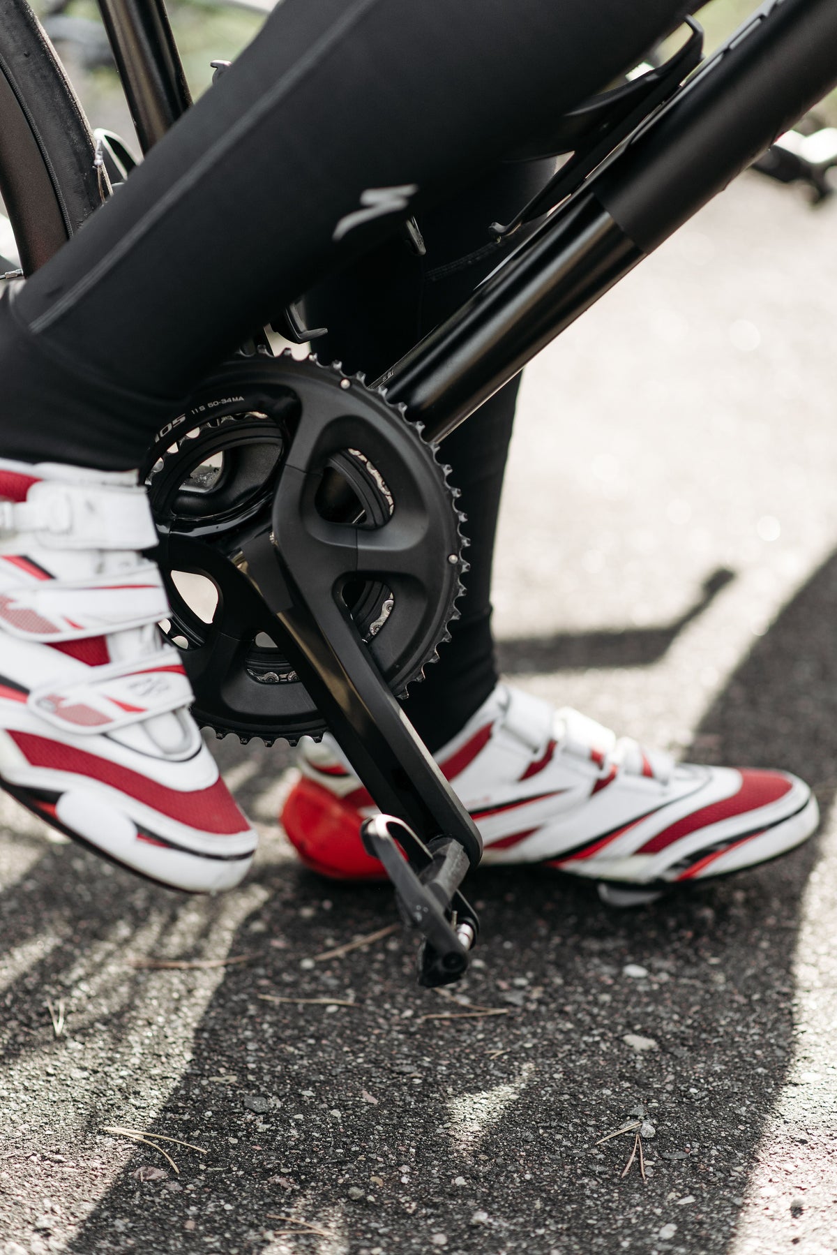 Cyclist using cycling shoes and pedals on a road bike
