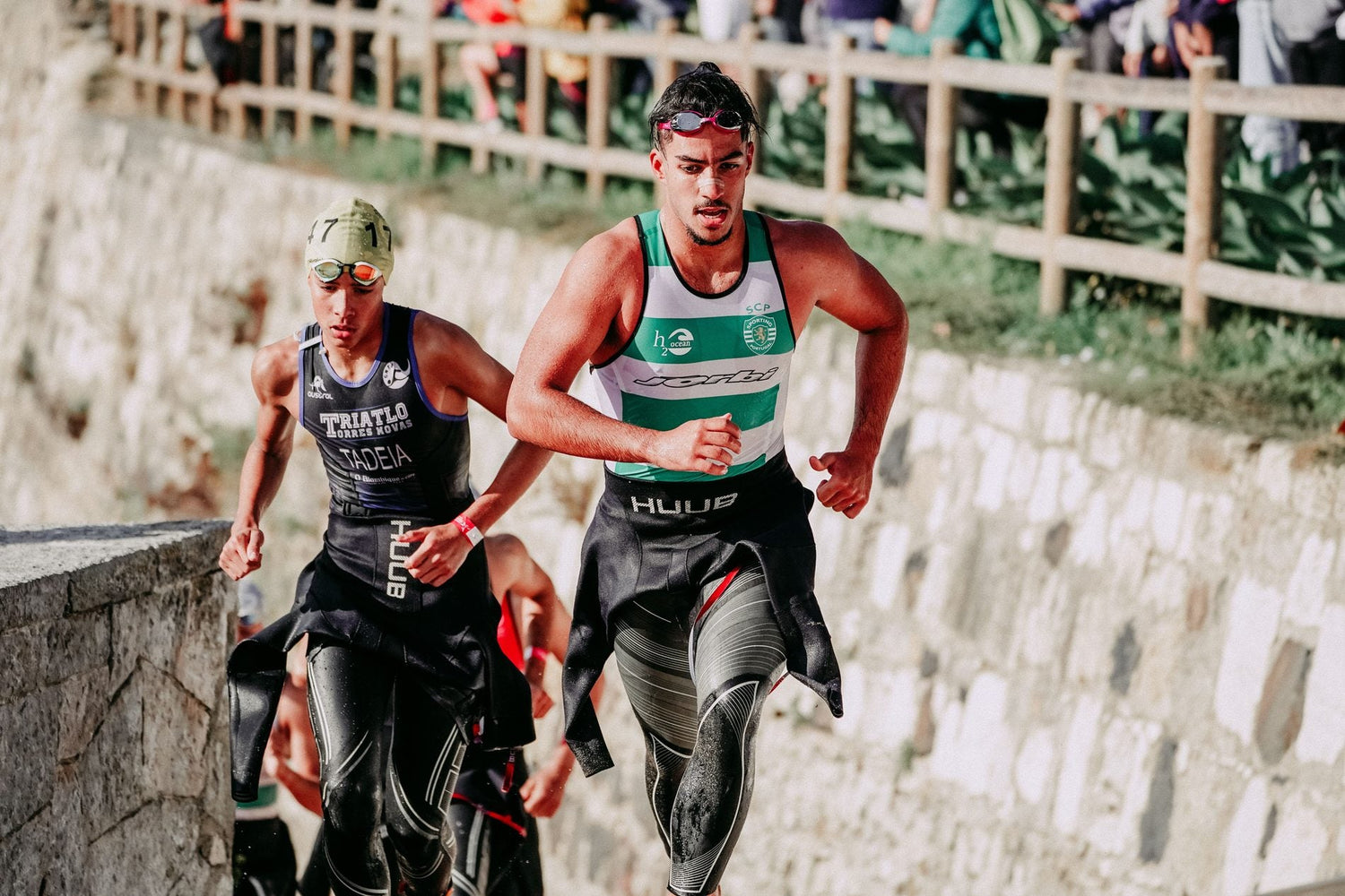 Triathletes running hard during a multisport race