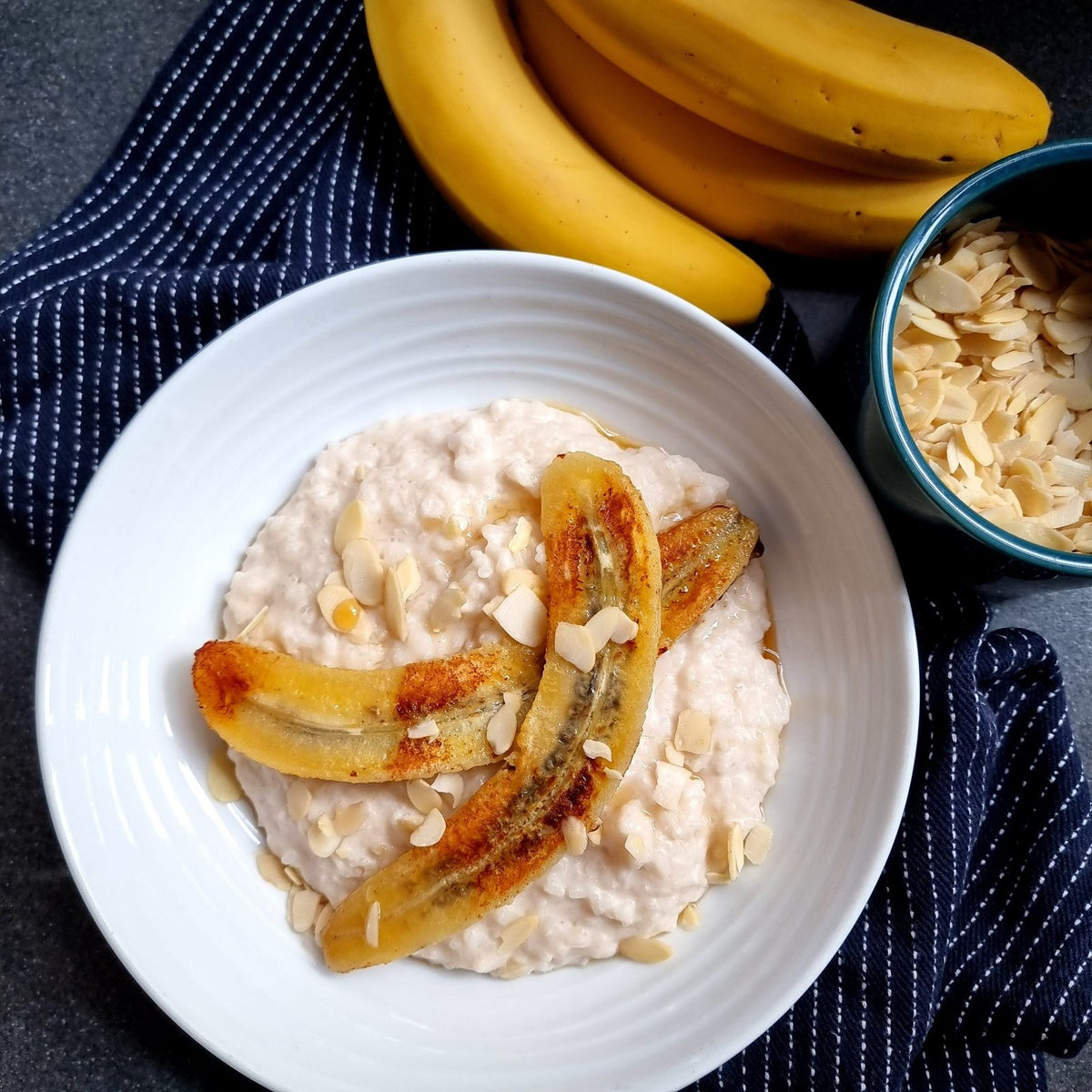 Oatmeal breakfast topped with sliced bananas